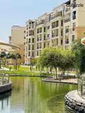 Apartment for sale in Sarai  New Cairo  on the Suez Road  directly next to Madinaty  double view landscape and lake