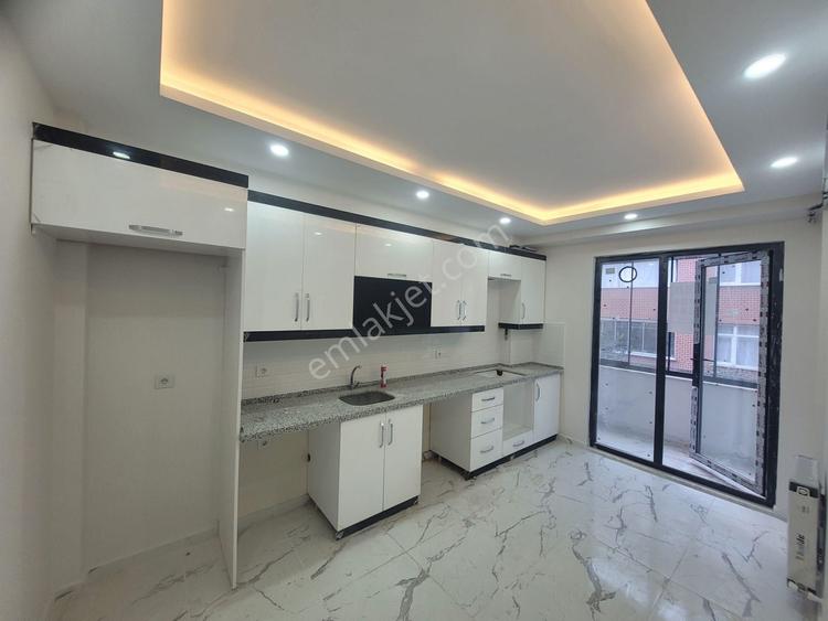  ARIKOĞLUNDAN U.MUMCUDA 2+1 115M2 EBEWEYNLİ SIFIR 1 KAT DAİRE