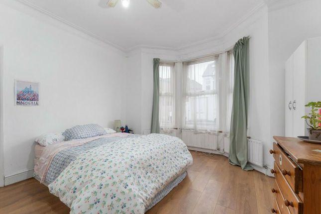 Terraced house to rent in Dewey Street, London SW17