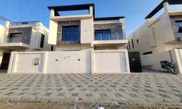 Goodbye, for rent, own a super deluxe villa in the heart of Ajman, central air conditioning, ready with machines, without down payment, at a very attr