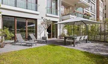 Design-Familien Gartenwohnung nahe Mediaspree mit zwei Terrassen