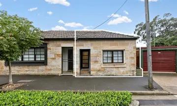 History, warmth and location updated sandstone cottage