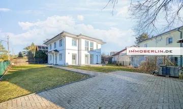 IMMOBERLIN.DE - Sehr attraktives KfW-55-Haus mit Sonnengarten in familienfreundlicher Lage